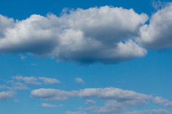 Blue Sky and Puffy Clouds