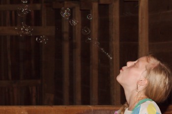 Hannah Blowing Bubbles