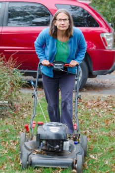 Cathy Mowing The Leaves