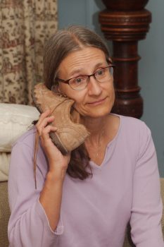 Cathy On Her Shoe Phone